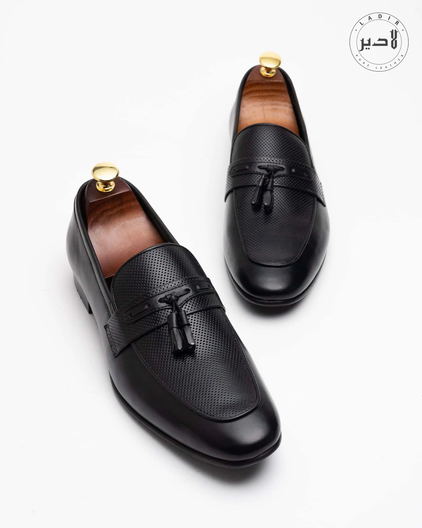Close-up of BRUNO BLACK formal shoes, highlighting the polished leather texture and fine stitching for durability.