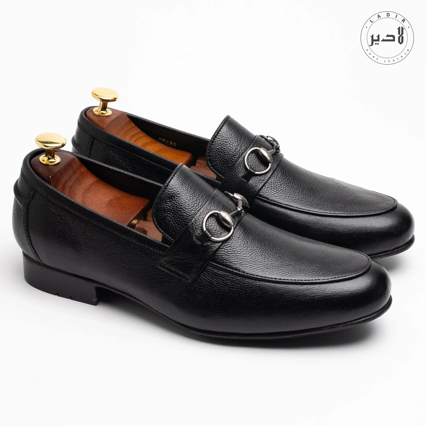 Overhead view of MOCA BLACK leather shoes, highlighting their timeless design and versatile appeal for formal settings.