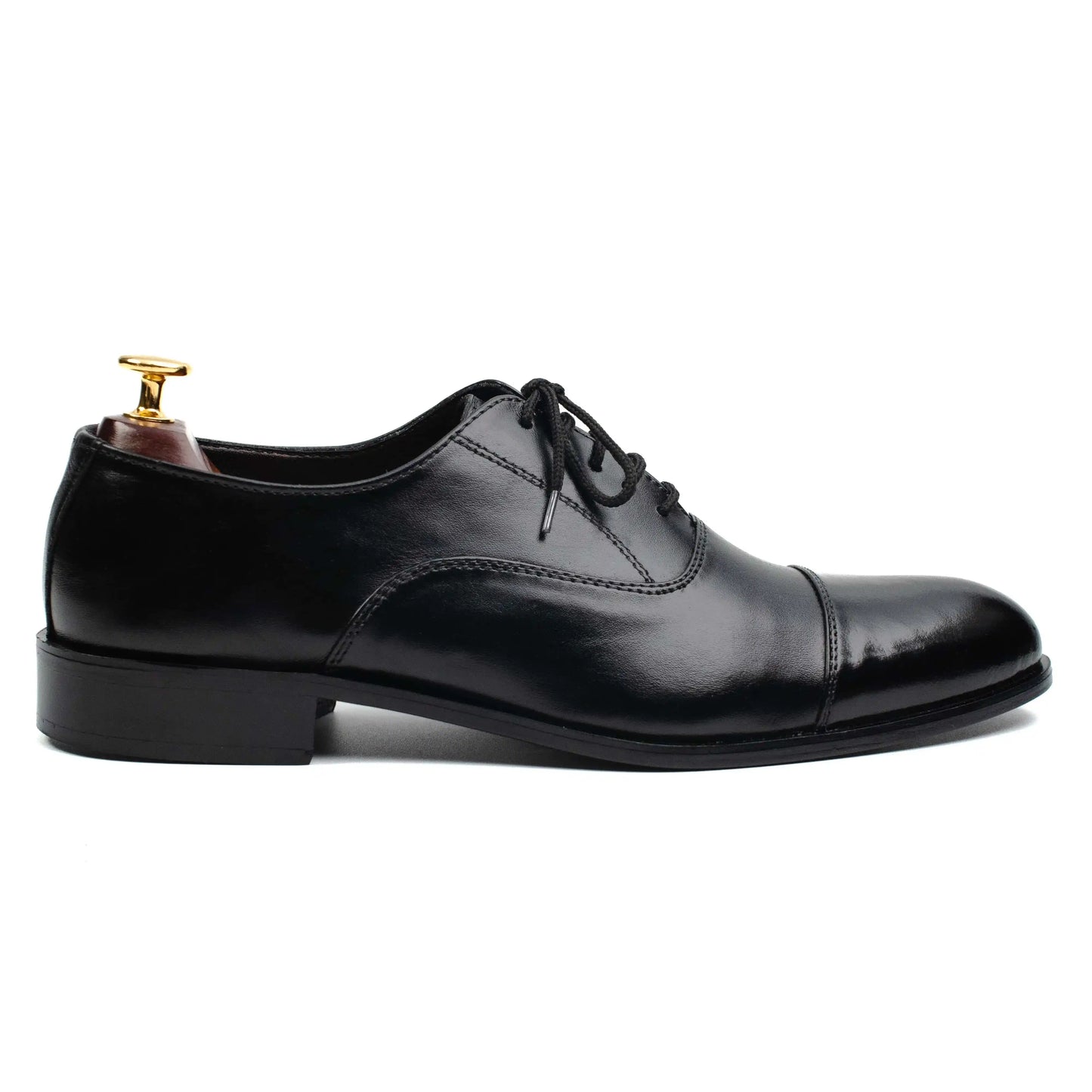 Side angle of OXFORD BLACK dress shoes, highlighting their premium leather craftsmanship and sleek, timeless silhouette.