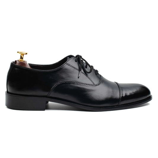 Side angle of OXFORD BLACK dress shoes, highlighting their premium leather craftsmanship and sleek, timeless silhouette.