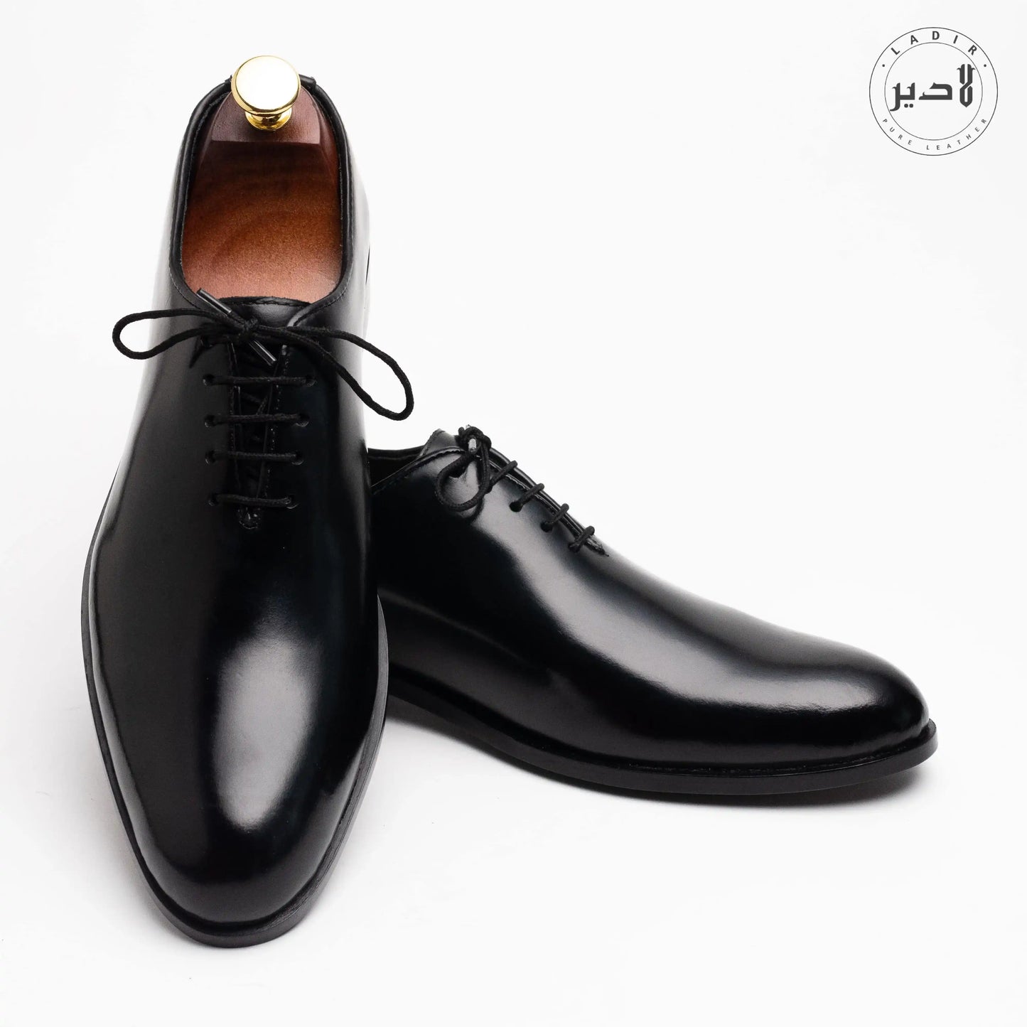 Front view of OXY BLACK formal leather shoes for men, showcasing a sleek, polished black finish and elegant design for formal occasions.