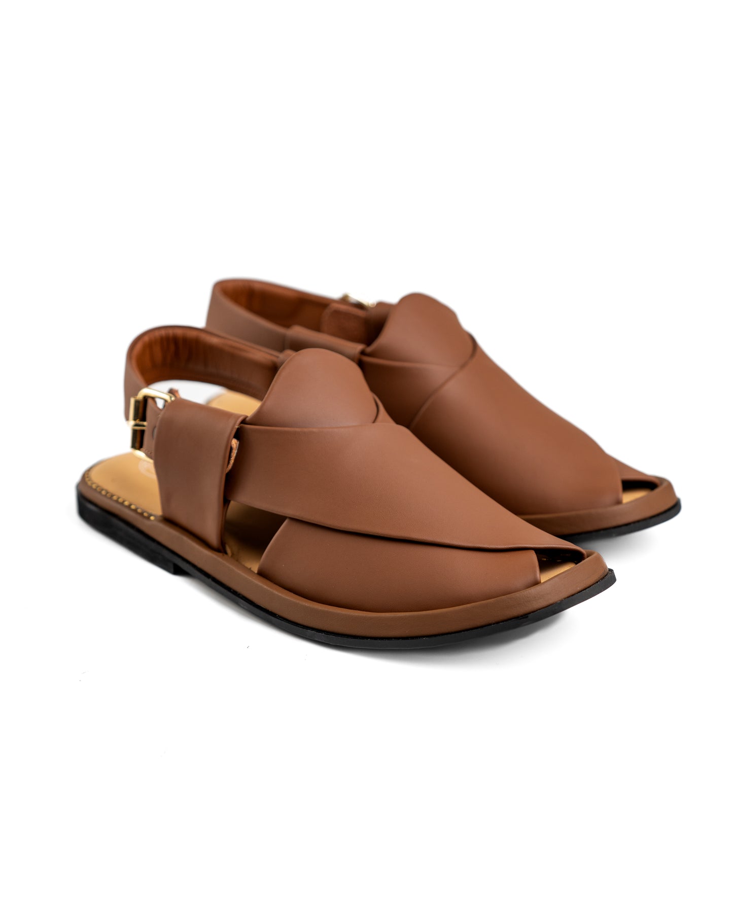 Angled shot of ROUND WALNUT Peshawari Chappal highlighting the intricate stitching details.