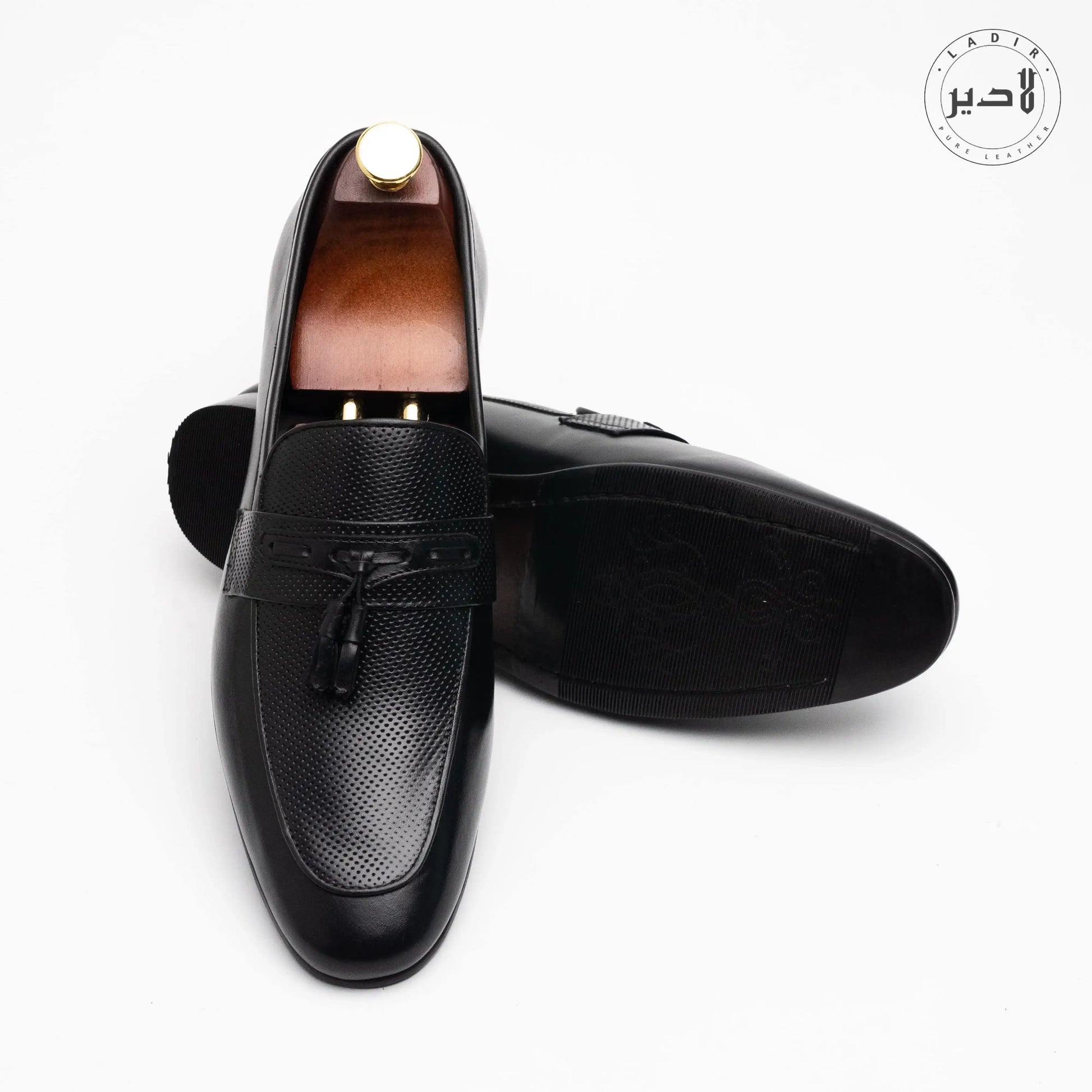 Front view of BRUNO BLACK dress shoes, featuring a sleek black leather finish and elegant design for formal occasions.
