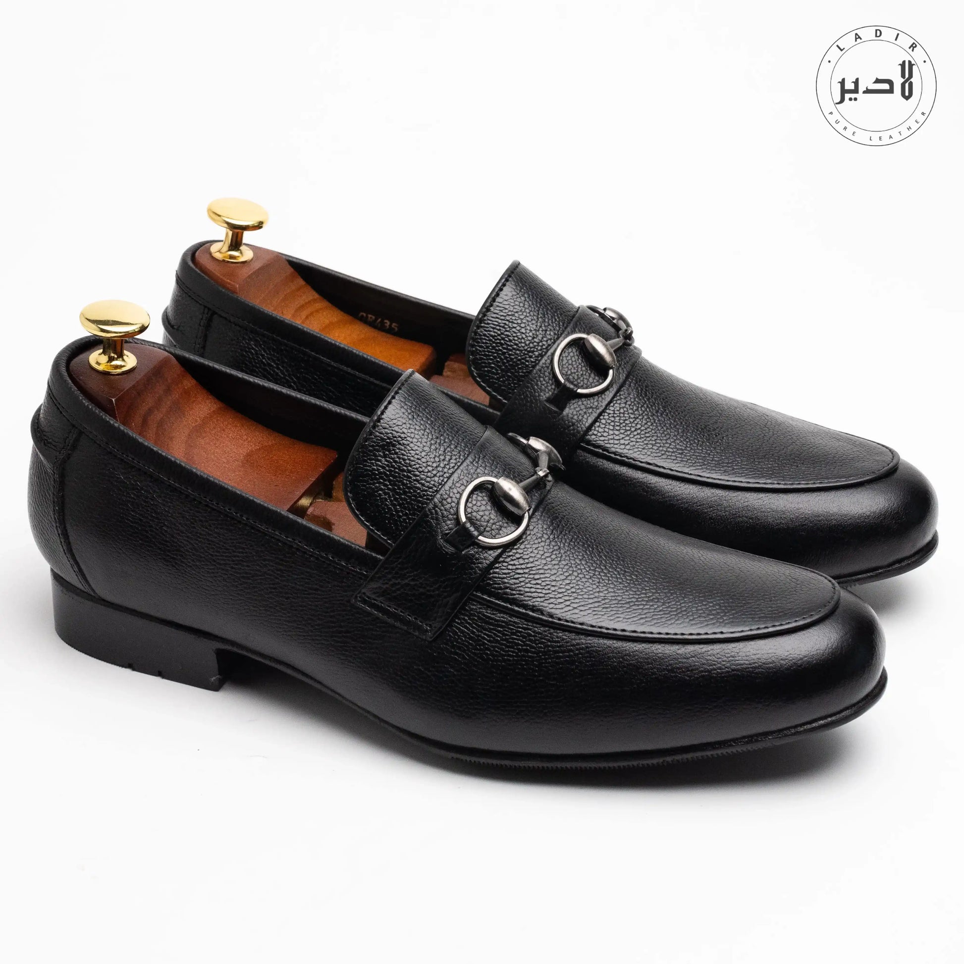 Overhead view of MOCA BLACK leather shoes, highlighting their timeless design and versatile appeal for formal settings.
