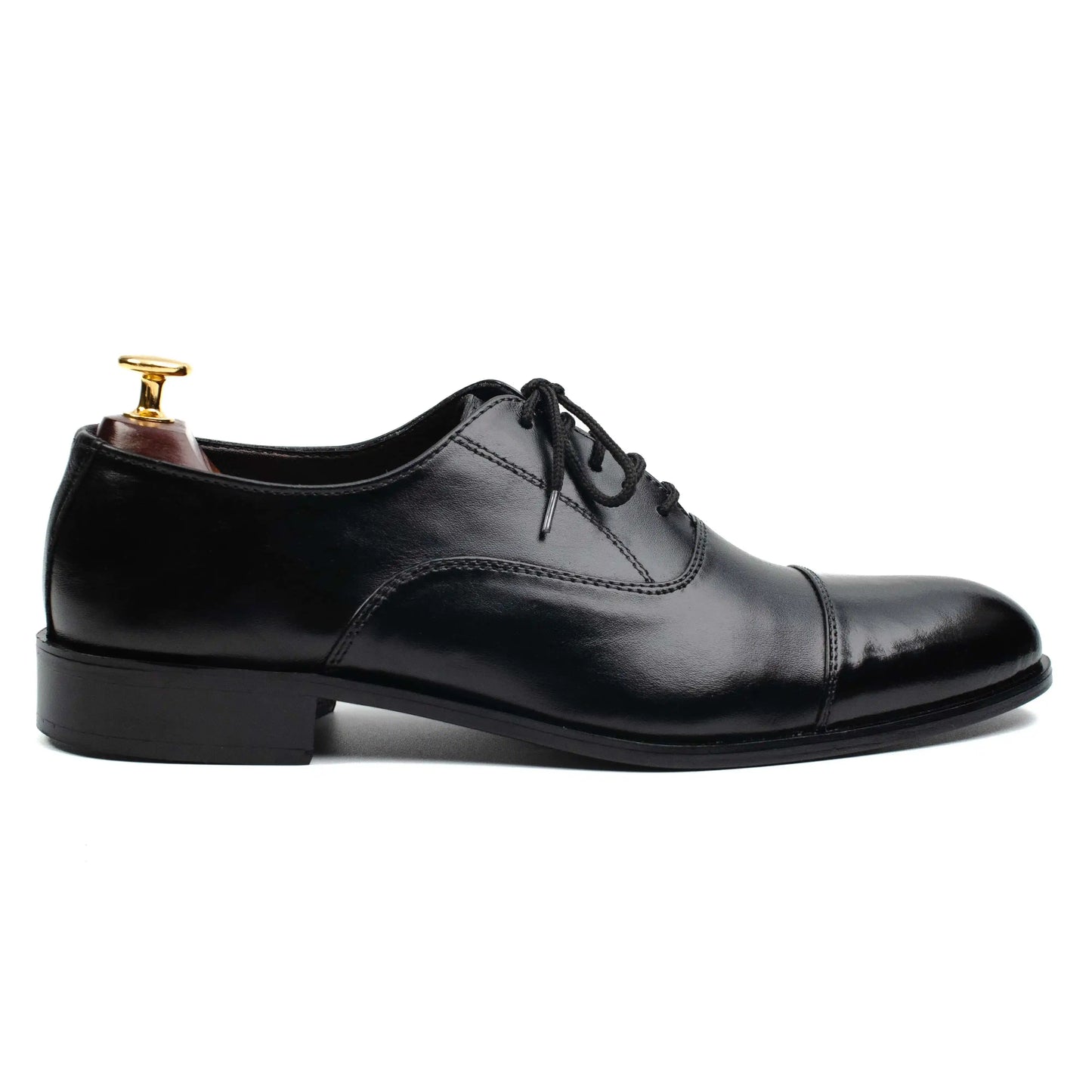 Side angle of OXFORD BLACK dress shoes, highlighting their premium leather craftsmanship and sleek, timeless silhouette.
